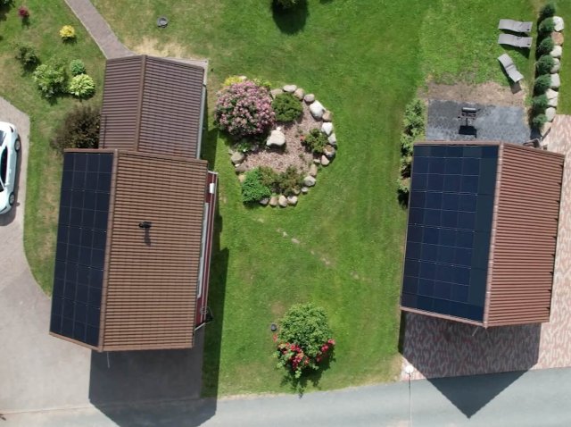 Residential homes with solar roof tiles. Solarstone.