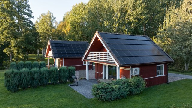 Tile roof homes with integrated solar roof panels. Solarstone.
