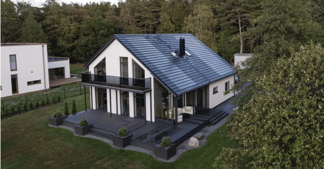 Residential roof with clean integrated solar panels. Solarstone.